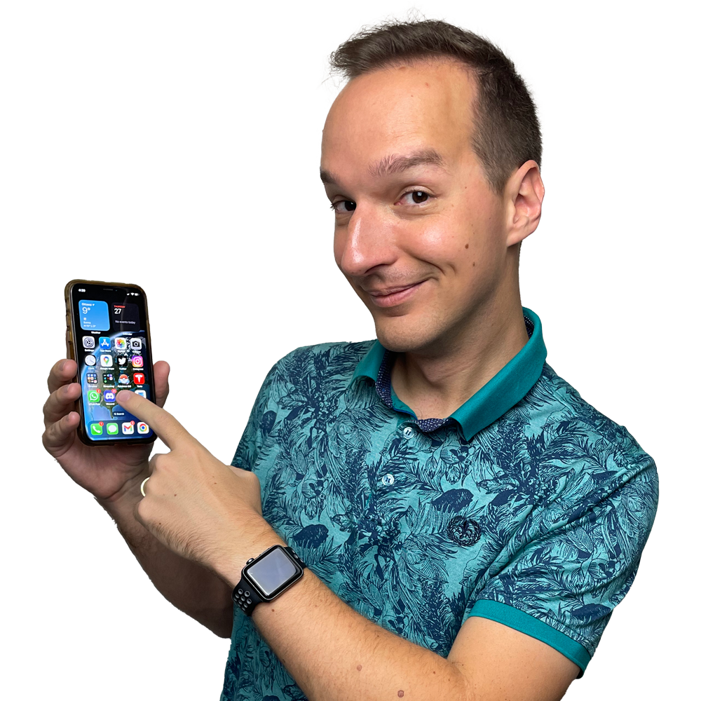 photo of myself grinning while pointing to a mobile phone
